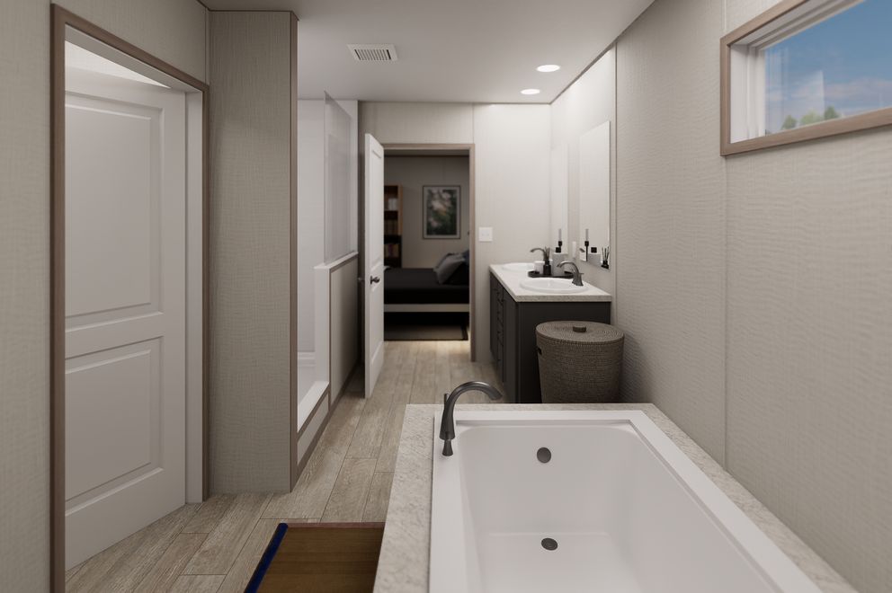 The ULTRA FLEX JEWEL Primary Bathroom. This Manufactured Mobile Home features 3 bedrooms and 2 baths.