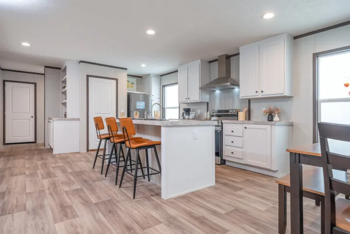 The EMPOWER Kitchen. This Manufactured Mobile Home features 4 bedrooms and 2 baths.