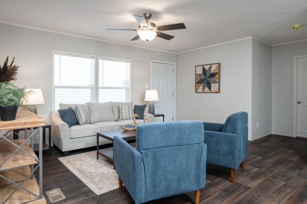 The THE EAGLE 48 Living Room. This Manufactured Mobile Home features 3 bedrooms and 2 baths.