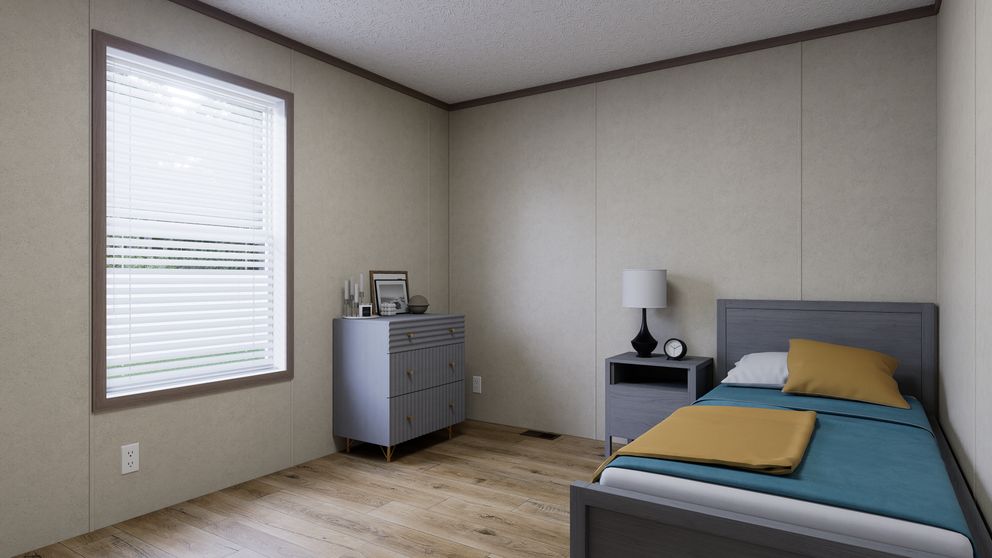 The 5228-CC51 PILLAR 52 Guest Bedroom. This Manufactured Mobile Home features 3 bedrooms and 2 baths.