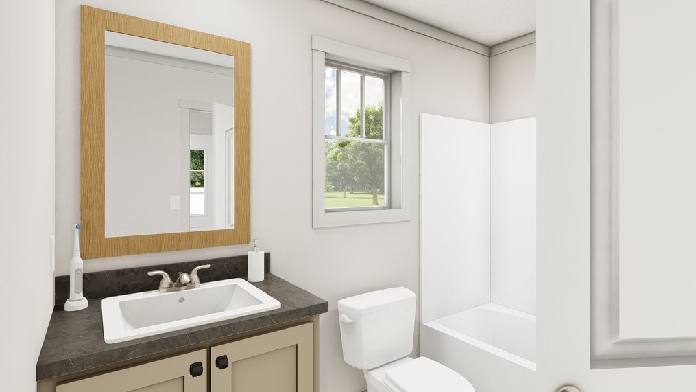 The 1007 "IMAGINE" 4014 Primary Bathroom. This Manufactured Mobile Home features 1 bedroom and 1 bath.