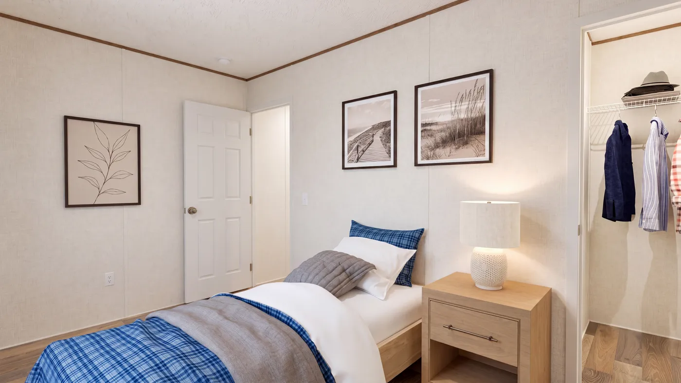 The DOGWOOD Guest Bedroom. This Manufactured Mobile Home features 2 bedrooms and 2 baths.