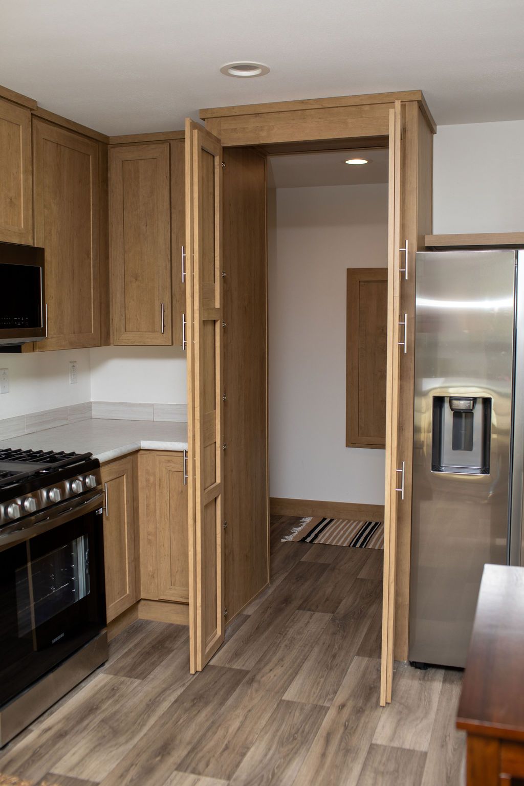 The RAMSEY 223 Kitchen. This Manufactured Mobile Home features 3 bedrooms and 2 baths.