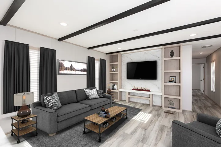 The THE ANNIVERSARY ISLANDER Living Room. This Manufactured Mobile Home features 3 bedrooms and 2 baths.