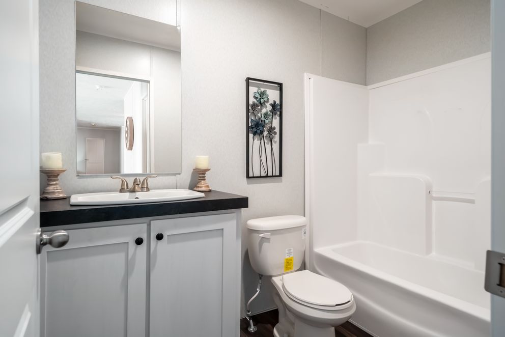 The THE EAGLE 48 Guest Bathroom. This Manufactured Mobile Home features 3 bedrooms and 2 baths.