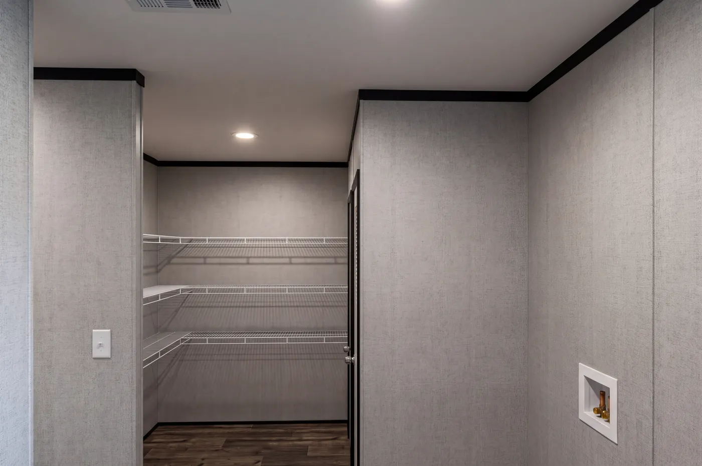The THE MOUNTAINEER 48 Pantry. This Manufactured Mobile Home features 3 bedrooms and 2 baths.