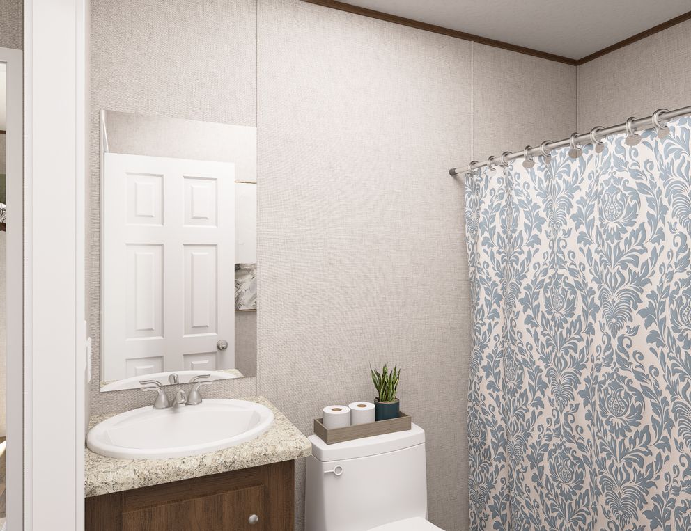 The TULIP Primary Bathroom. This Manufactured Mobile Home features 2 bedrooms and 1 bath.