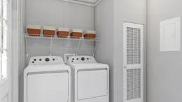The THE FUSION C Utility Room. This Manufactured Mobile Home features 3 bedrooms and 2 baths.