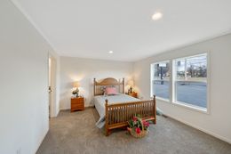 The LEHIGH 5628-1965 Primary Bedroom. This Manufactured Mobile Home features 3 bedrooms and 2 baths.