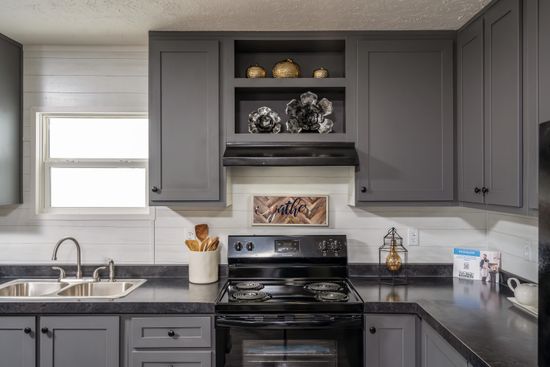 The TRADITION 60B Kitchen. This Manufactured Mobile Home features 3 bedrooms and 2 baths.