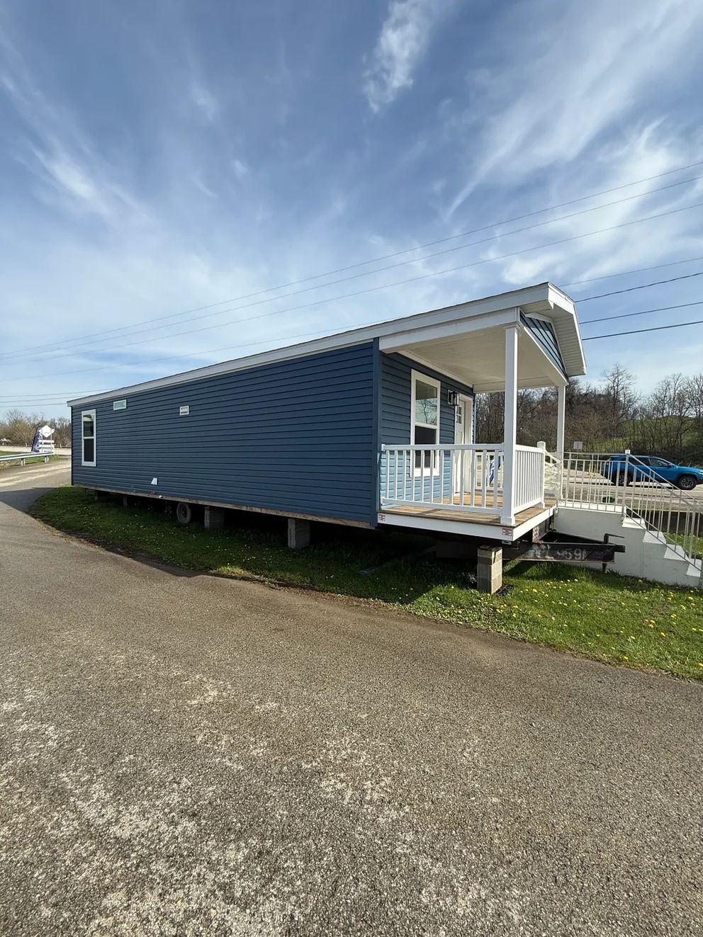 The ONYX Exterior. This Manufactured Mobile Home features 1 bedroom and 1 bath.