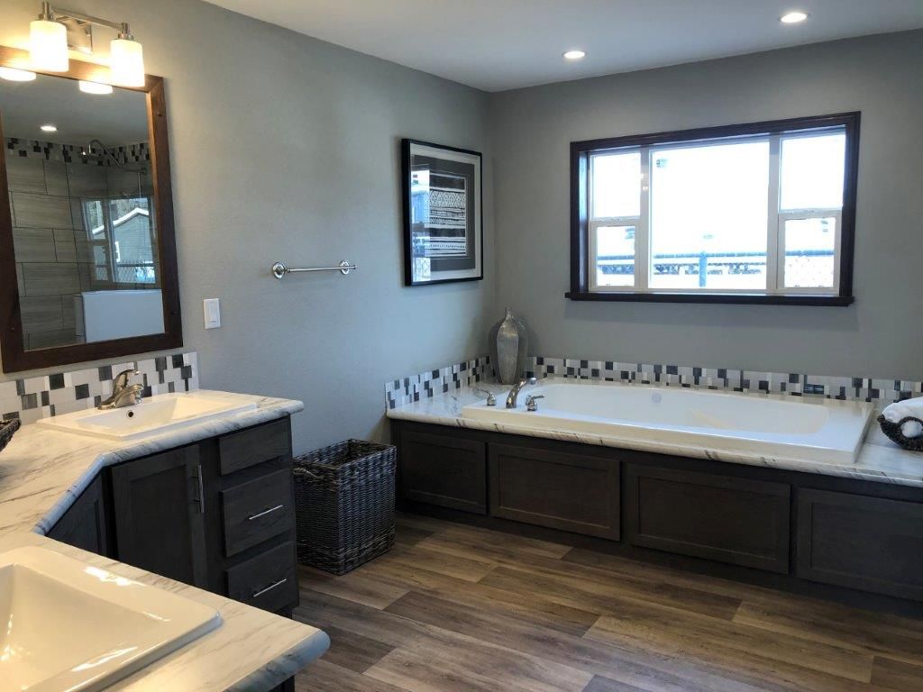 The LEGACY 572 MOD Primary Bathroom. This Modular Home features 3 bedrooms and 2 baths.