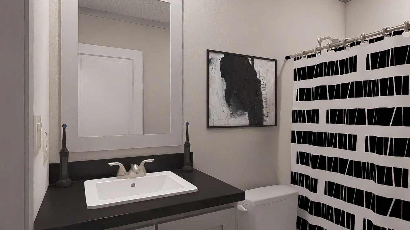 The JOHNNY B GOODE Guest Bathroom. This Manufactured Mobile Home features 3 bedrooms and 2 baths.