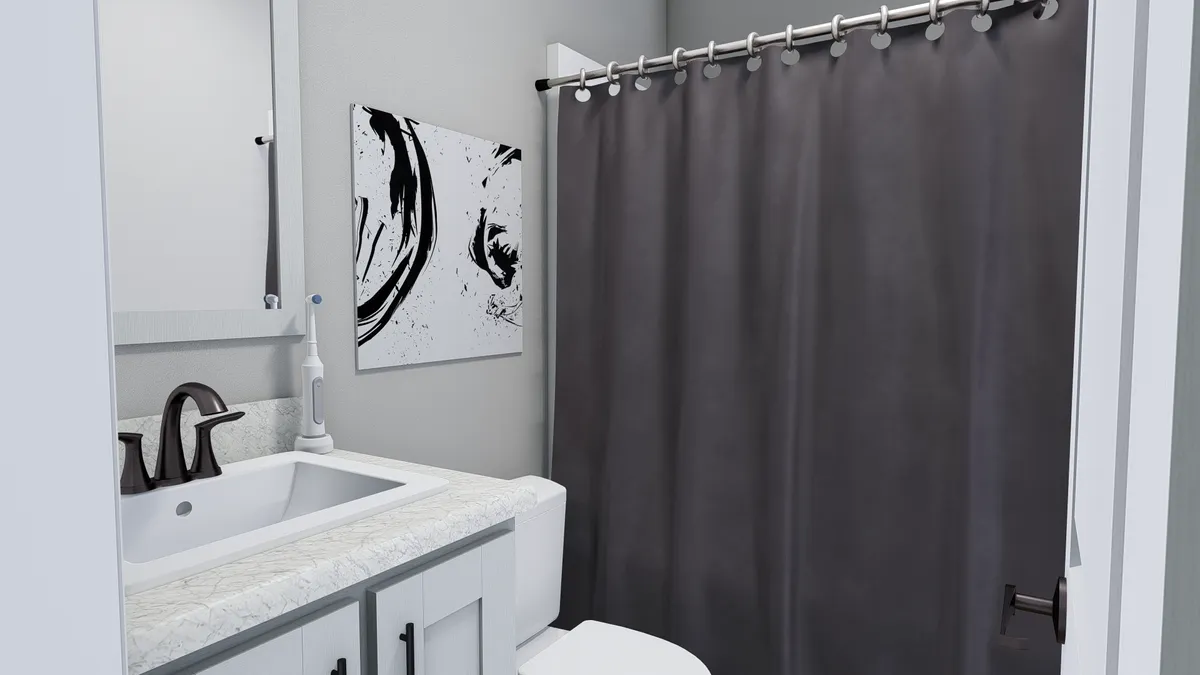 The THE HOLLYWOOD Guest Bathroom. This Manufactured Mobile Home features 3 bedrooms and 2 baths.