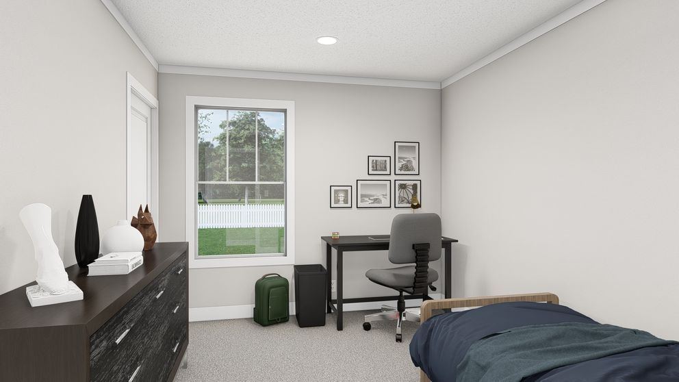 The BROWN EYED GIRL Guest Bedroom. This Manufactured Mobile Home features 4 bedrooms and 2 baths.