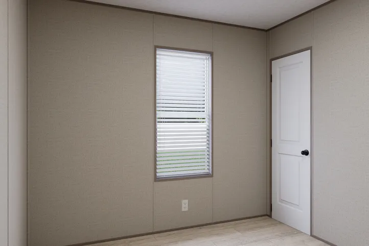 The THE ANNIVERSARY 76 Guest Bedroom. This Manufactured Mobile Home features 3 bedrooms and 2 baths.