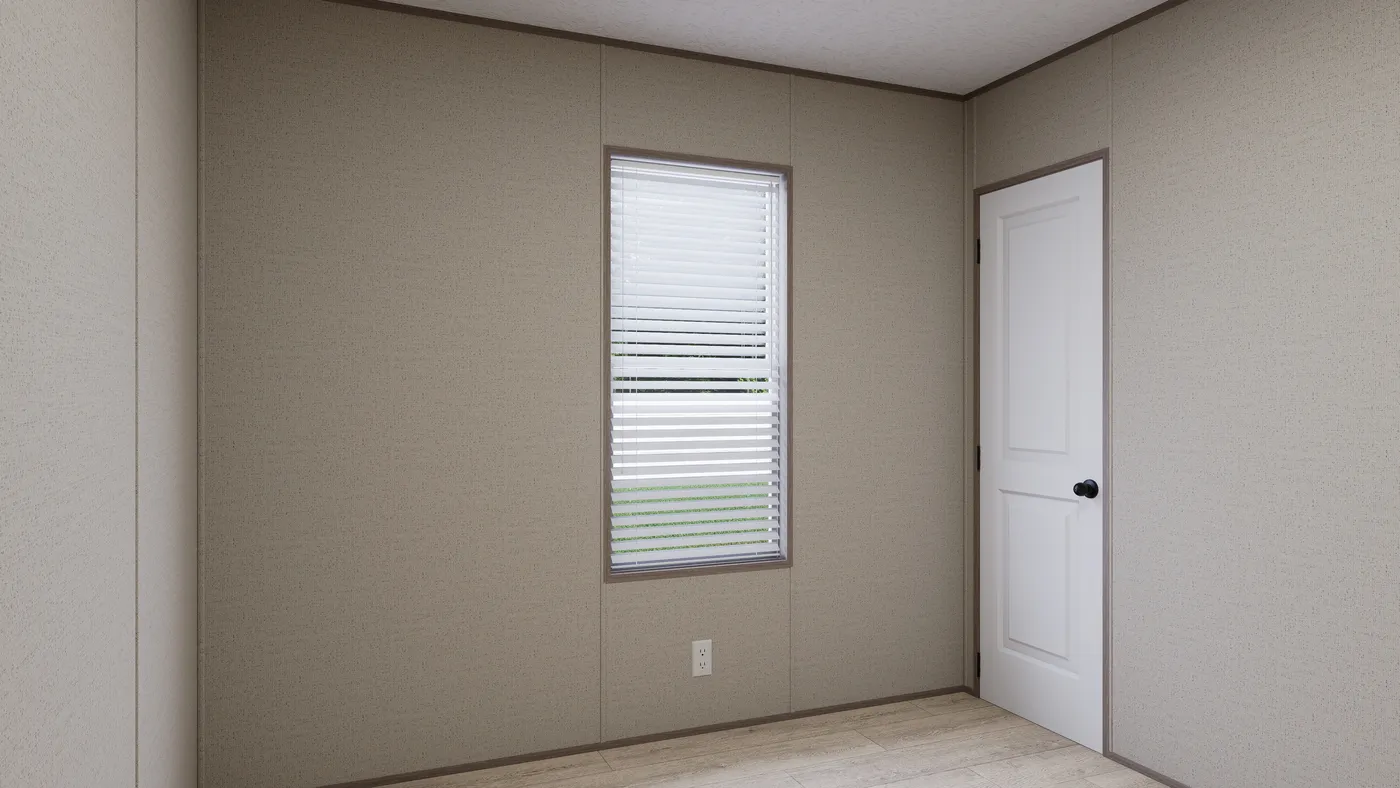 The THE ANNIVERSARY 76 Guest Bedroom. This Manufactured Mobile Home features 3 bedrooms and 2 baths.
