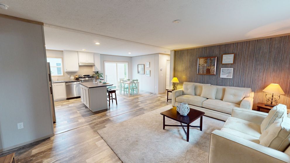 The FRANKLIN Living Room. This Manufactured Mobile Home features 3 bedrooms and 2 baths.