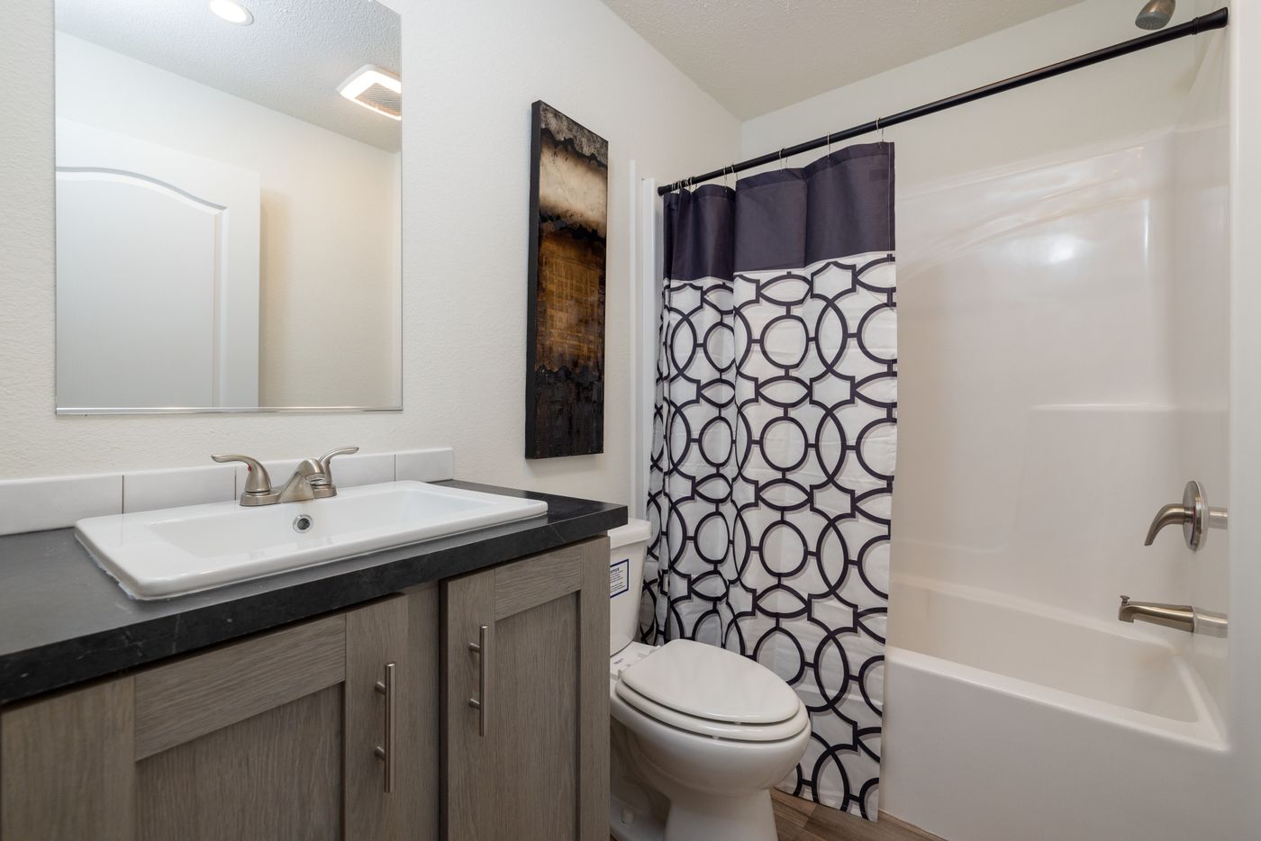 The RAMSEY 217-1 Guest Bathroom. This Manufactured Mobile Home features 3 bedrooms and 2 baths.