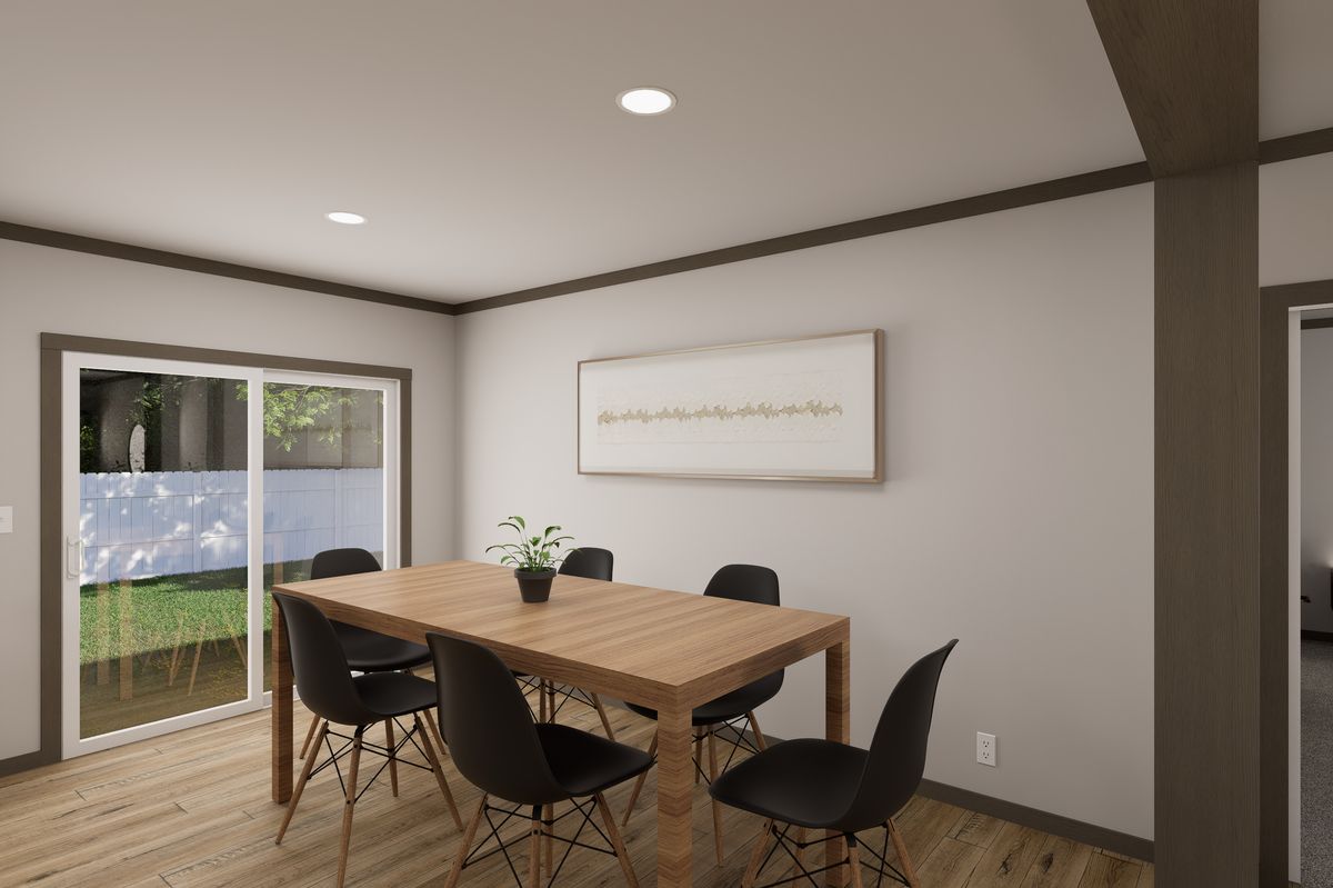 The EASY LIVIN' Dining Area. This Manufactured Mobile Home features 3 bedrooms and 2 baths.