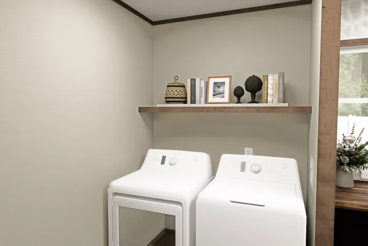 The FIJI Utility Room. This Manufactured Mobile Home features 3 bedrooms and 2 baths.