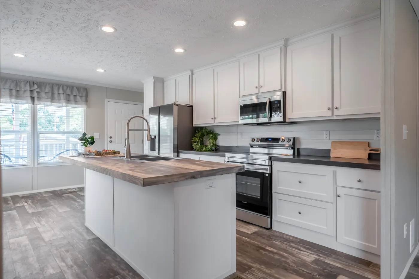 The NORTHSHORE Kitchen. This Manufactured Mobile Home features 3 bedrooms and 2 baths.