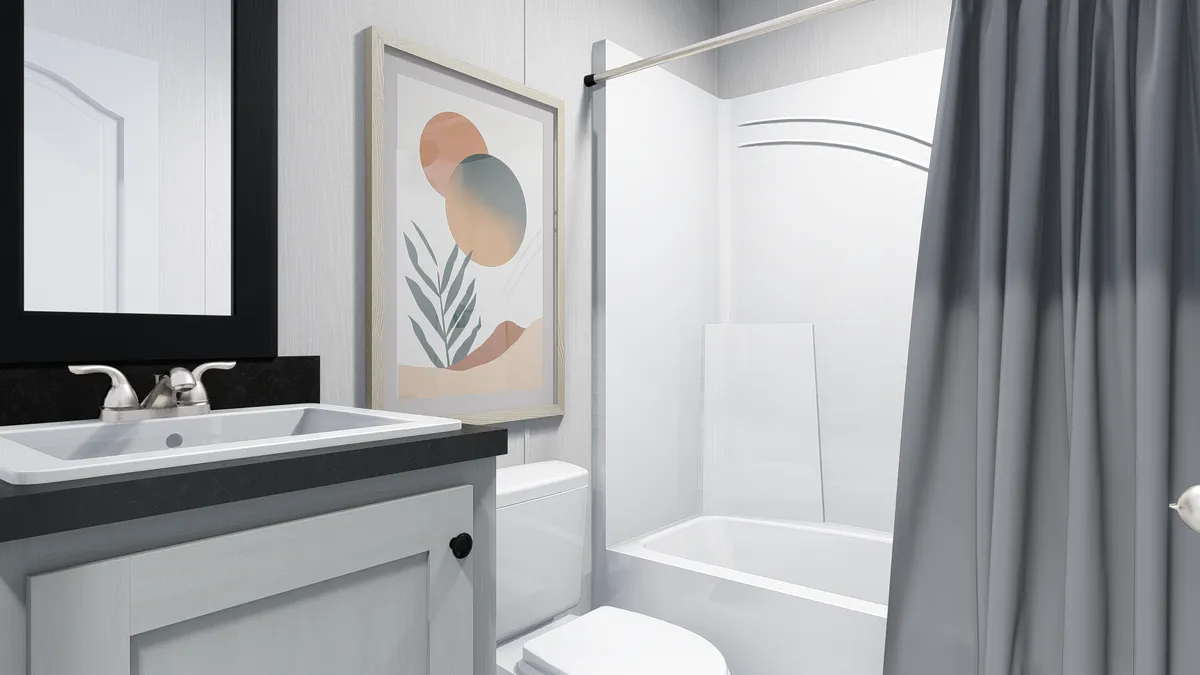 The 5616-4779 THE PULSE Guest Bathroom. This Manufactured Mobile Home features 2 bedrooms and 2 baths.