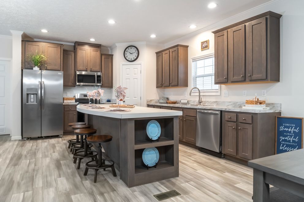 The 3542 HUD 56X28 CAVALIER SELECT Kitchen. This Manufactured Mobile Home features 3 bedrooms and 2 baths.