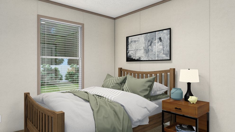 The 4428-E781 THE PULSE Guest Bedroom. This Manufactured Mobile Home features 3 bedrooms and 2 baths.
