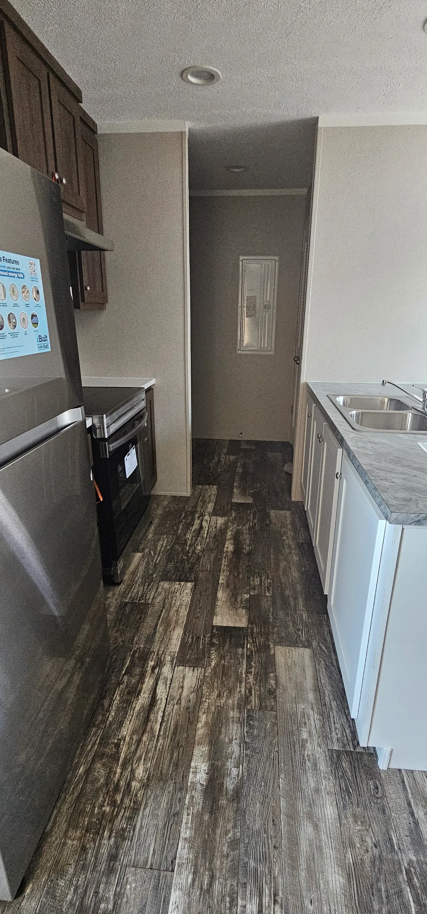 The ONYX 48 Kitchen. This Manufactured Mobile Home features 2 bedrooms and 1 bath.