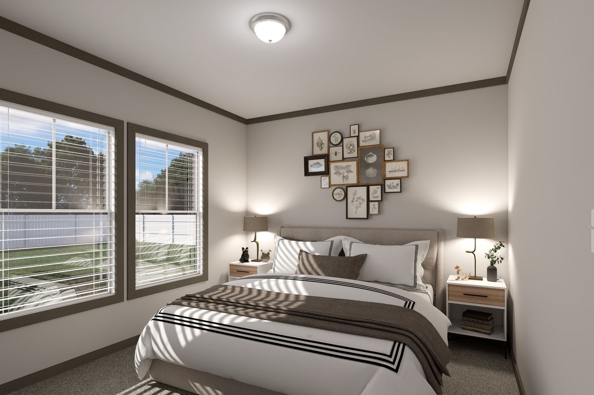 The EASY LIVIN' Bedroom. This Manufactured Mobile Home features 3 bedrooms and 2 baths.
