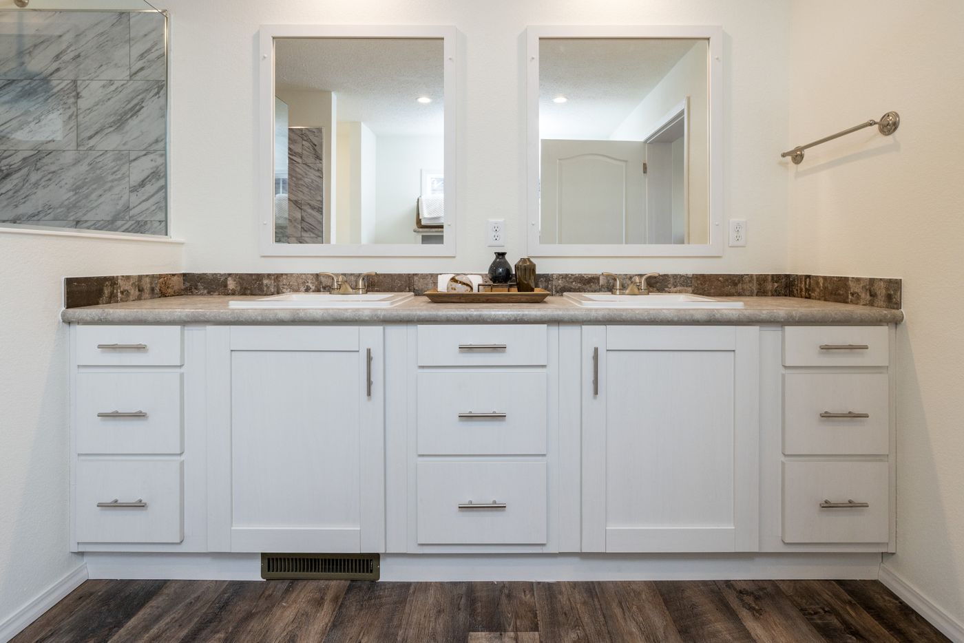The THE WASHINGTON MOD Primary Bathroom. This Modular Home features 3 bedrooms and 2 baths.