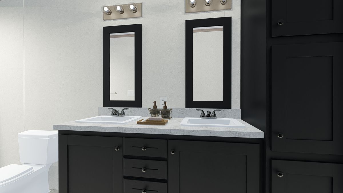 The 6616-4779 THE PULSE Primary Bathroom. This Manufactured Mobile Home features 3 bedrooms and 2 baths.