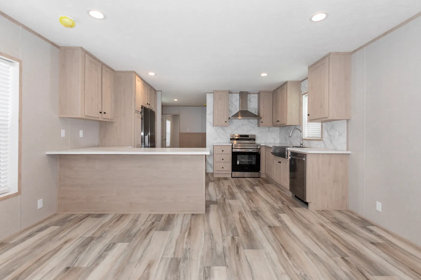 The THE THUNDERHEAD Living Room. This Manufactured Mobile Home features 3 bedrooms and 2 baths.