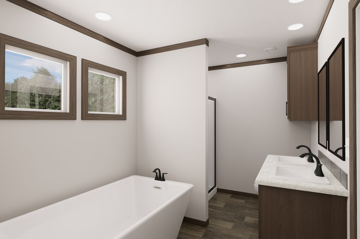 The THE TRUMAN Primary Bathroom. This Manufactured Mobile Home features 3 bedrooms and 2 baths.