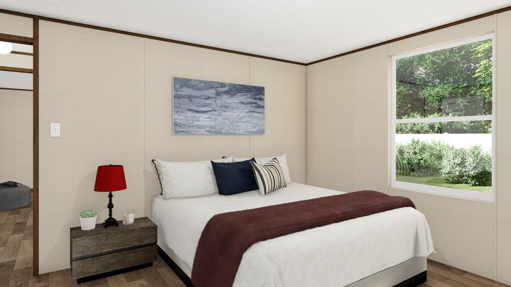 The TRIUMPH Guest Bedroom. This Manufactured Mobile Home features 5 bedrooms and 3 baths.