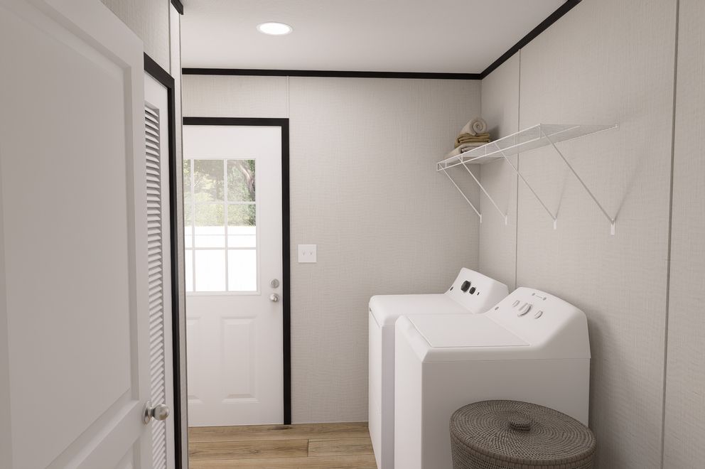 The ULTRA FLEX Utility Room. This Manufactured Mobile Home features 3 bedrooms and 2 baths.