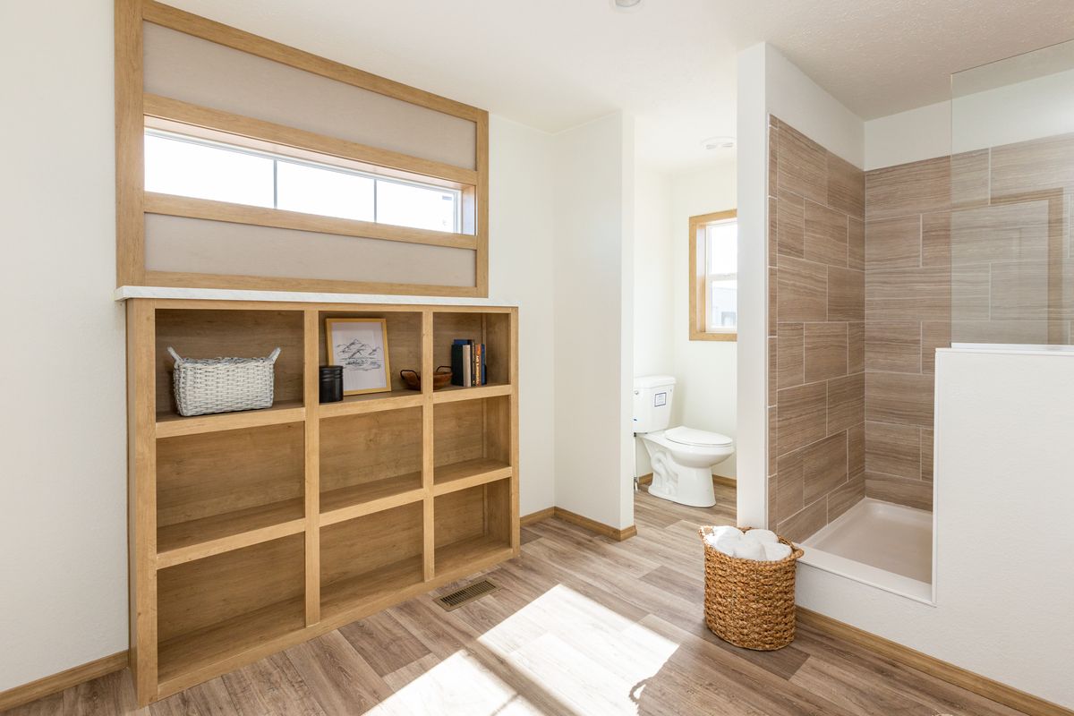 The THE ANTHONY Primary Bathroom. This Manufactured Mobile Home features 2 bedrooms and 2 baths.
