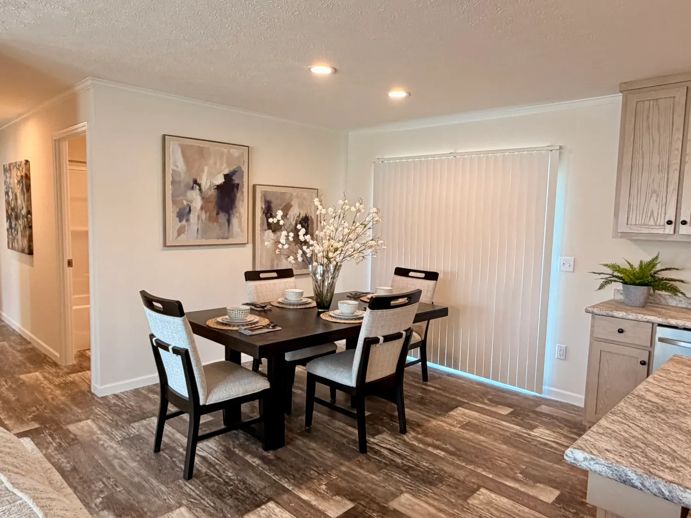 The TOURMALINE 7628-649 Dining Area. This Manufactured Mobile Home features 4 bedrooms and 2 baths.