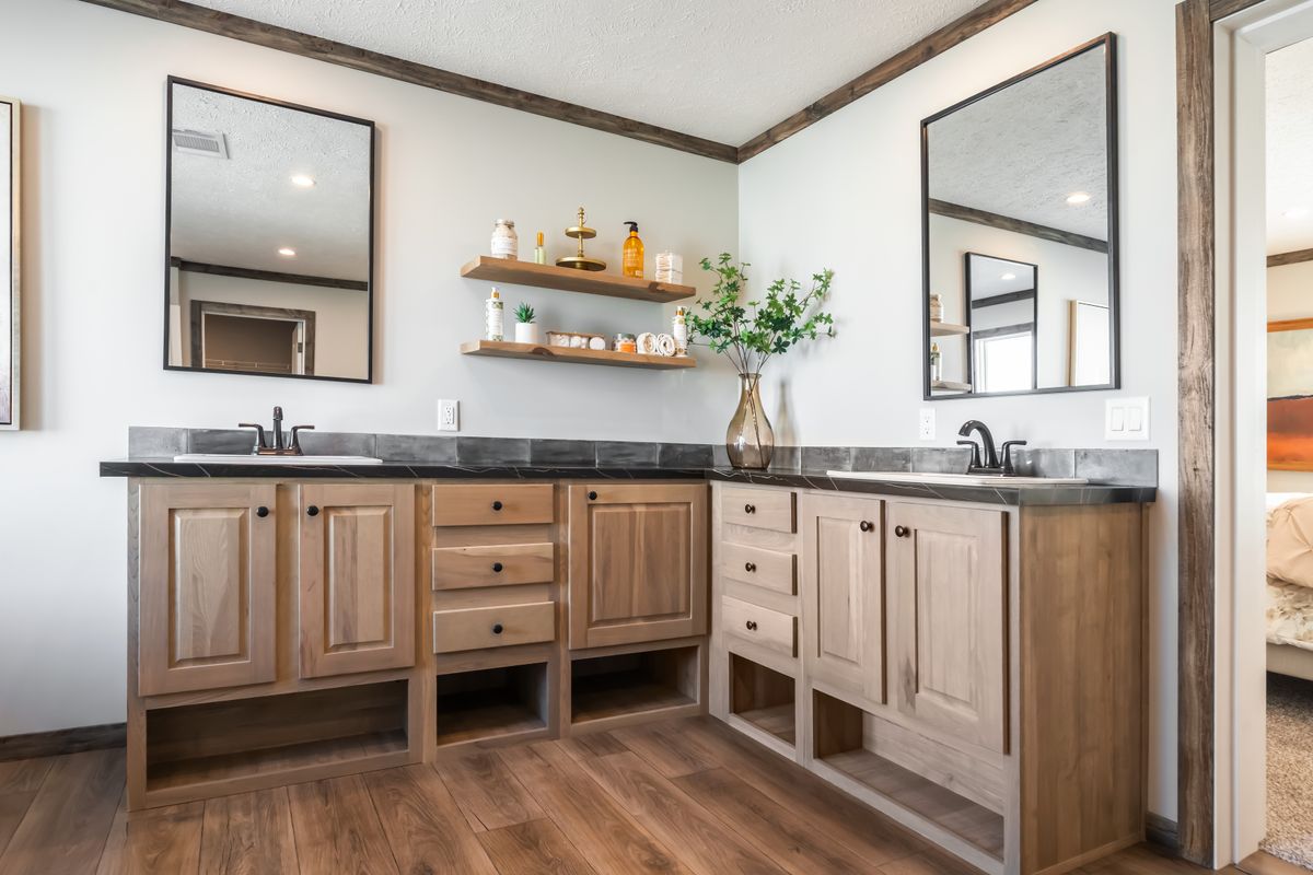 The THE JACKSON Primary Bathroom. This Manufactured Mobile Home features 4 bedrooms and 2 baths.