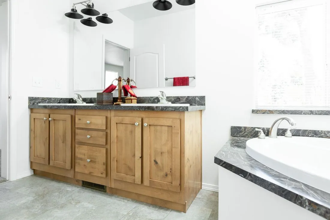 The 2025 COLUMBIA RIVER (NEW) Primary Bathroom. This Manufactured Mobile Home features 4 bedrooms and 2 baths.