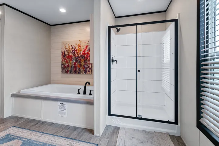 The HERCULES Primary Bathroom. This Manufactured Mobile Home features 4 bedrooms and 2 baths.