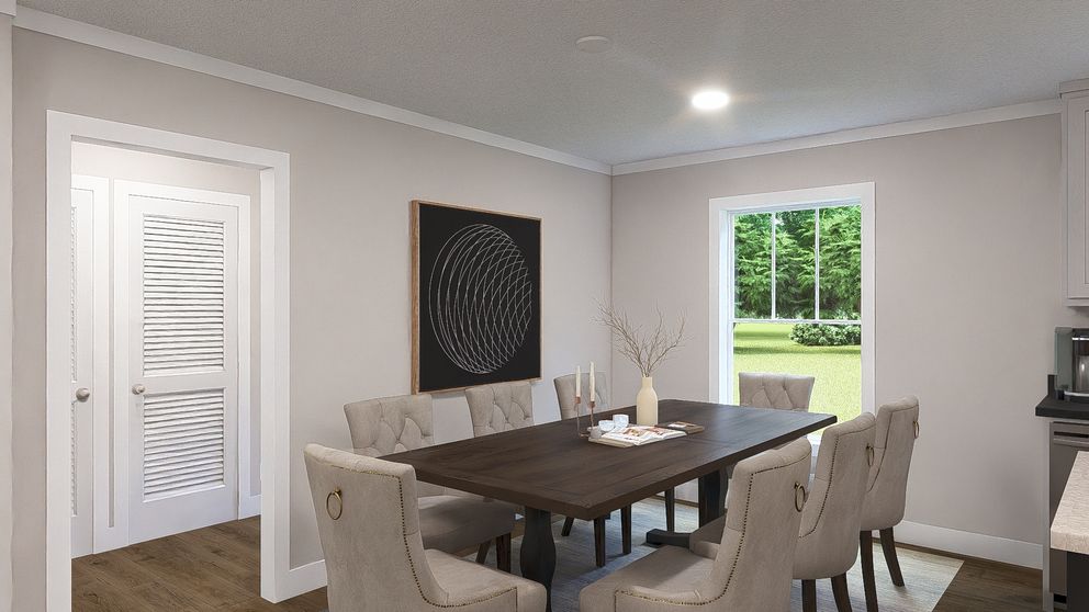 The LEAN ON ME Dining Area. This Modular Home features 3 bedrooms and 2 baths.