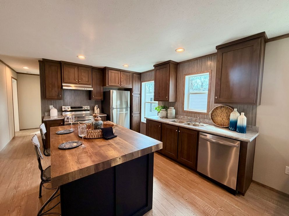 The APATITE Kitchen. This Manufactured Mobile Home features 3 bedrooms and 2 baths.