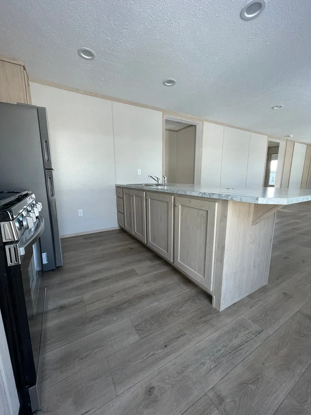The JADE 48 Kitchen. This Manufactured Mobile Home features 3 bedrooms and 2 baths.