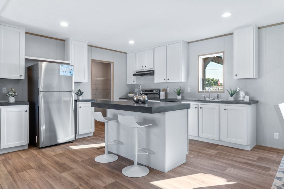 The ASPIRE Kitchen. This Manufactured Mobile Home features 3 bedrooms and 2 baths.
