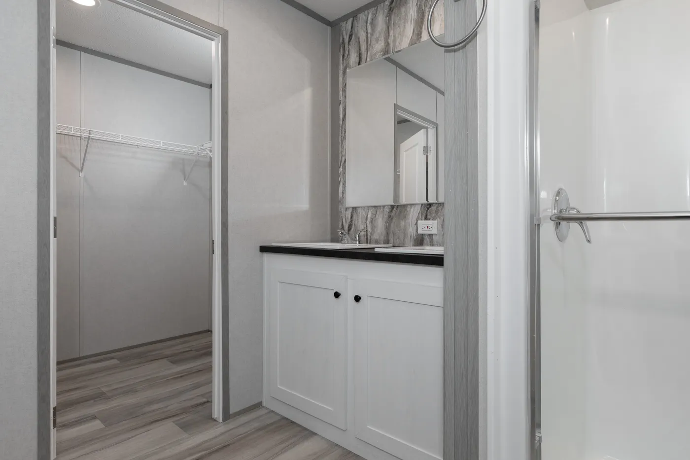 The THE PANTRY HOUSE Primary Bathroom. This Manufactured Mobile Home features 3 bedrooms and 2 baths.