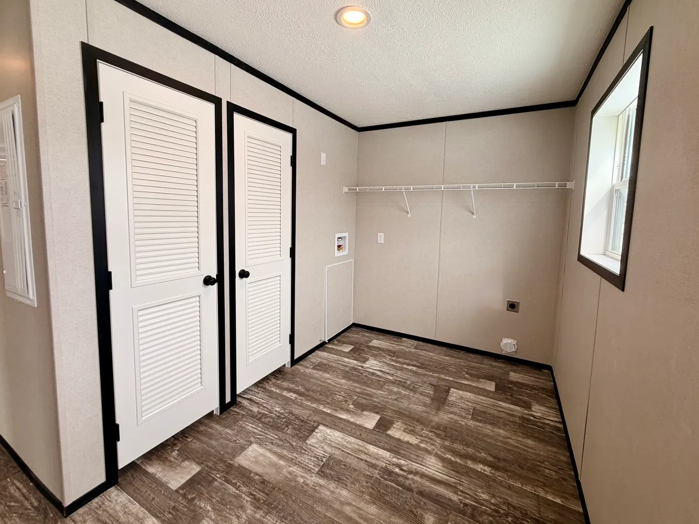 The DIAMOND Utility Room. This Manufactured Mobile Home features 3 bedrooms and 2 baths.
