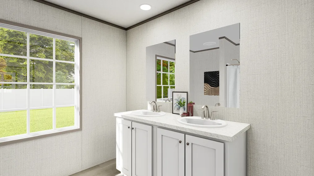 The LEGEND 28X56 COASTAL BREEZE II Guest Bathroom. This Manufactured Mobile Home features 3 bedrooms and 2 baths.