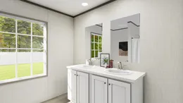 The LEGEND 28X56 COASTAL BREEZE II Guest Bathroom. This Manufactured Mobile Home features 3 bedrooms and 2 baths.